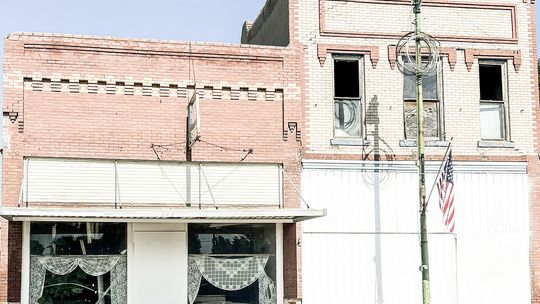 Demolition begins on long vacated buildings in downtown Harvard