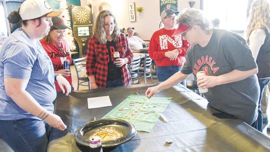 Sixty-two (& a half) teams golf in Deweese Redneck Tournament