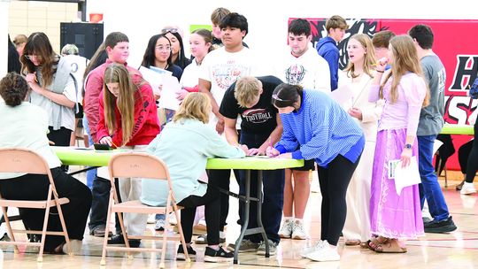 Sutton Career Day shows students how quickly costs add up