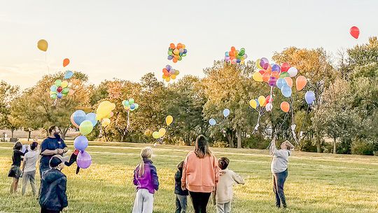 With love and remembrance, balloons rise over Harvard Oct. 18