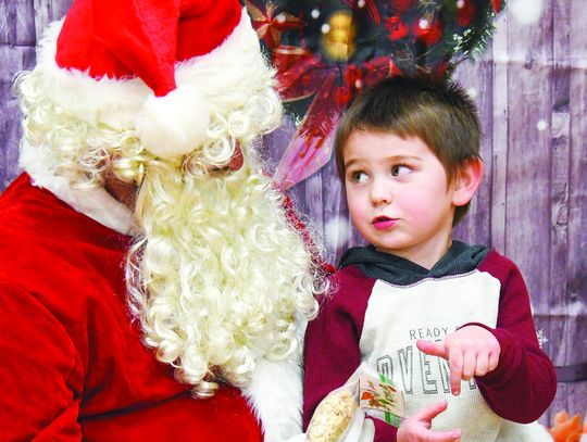 Telling Santa what they want for Christmas