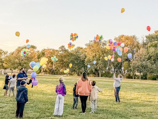With love and remembrance, balloons rise over Harvard Oct. 18