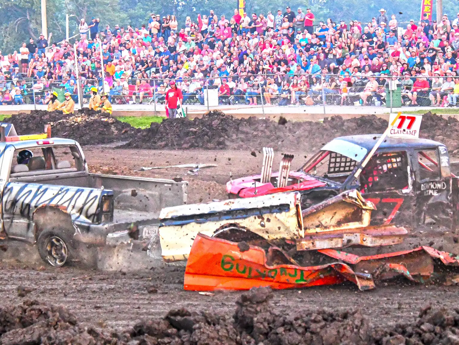 And the crowd goes wild for those racing cars, trucks