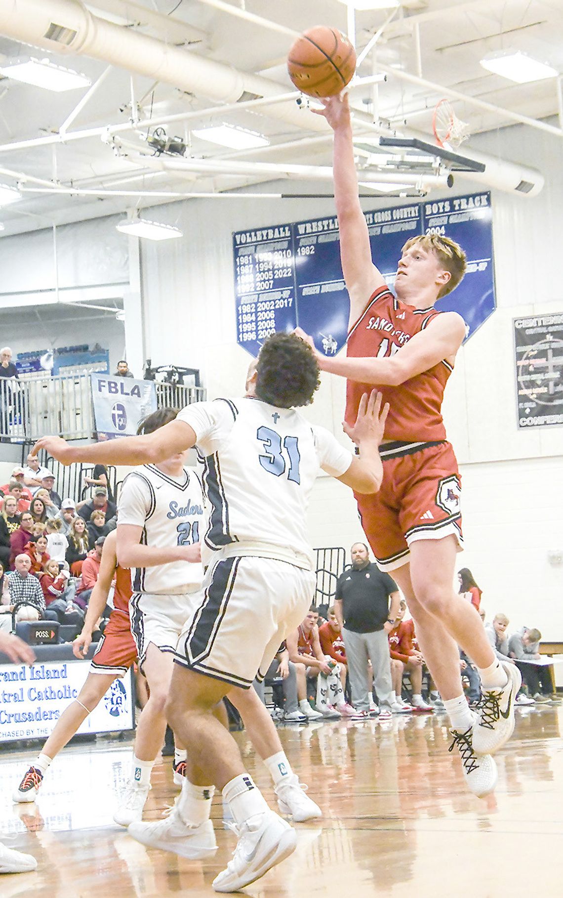 Cougars split with GICC, St. Pats during holiday tourney