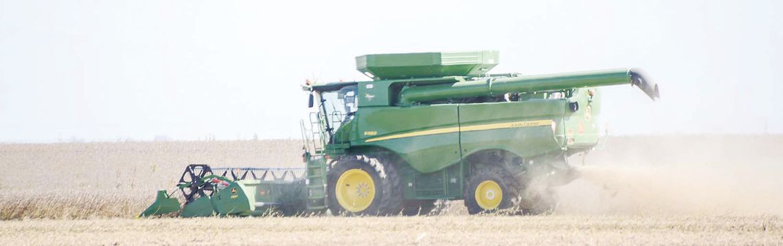 Fields busy with harvest activity