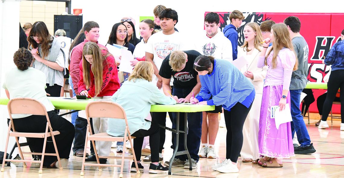 Sutton Career Day shows students how quickly costs add up Sutton Career Day shows students how quickly costs add up