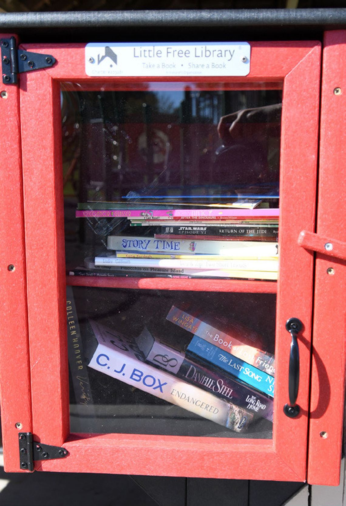 Sutton Library installs 2 Free Little Libraries